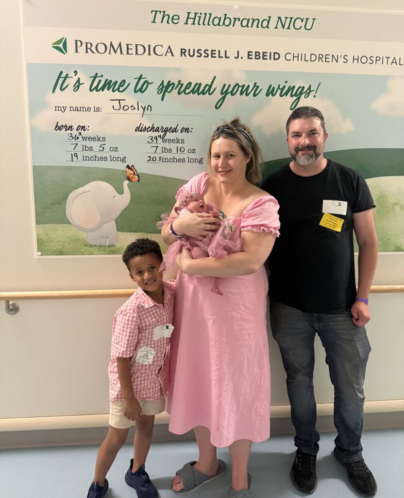 Jamie and Josh McMillan with Jakob and baby Joslyn on the day Joslyn left the NICU