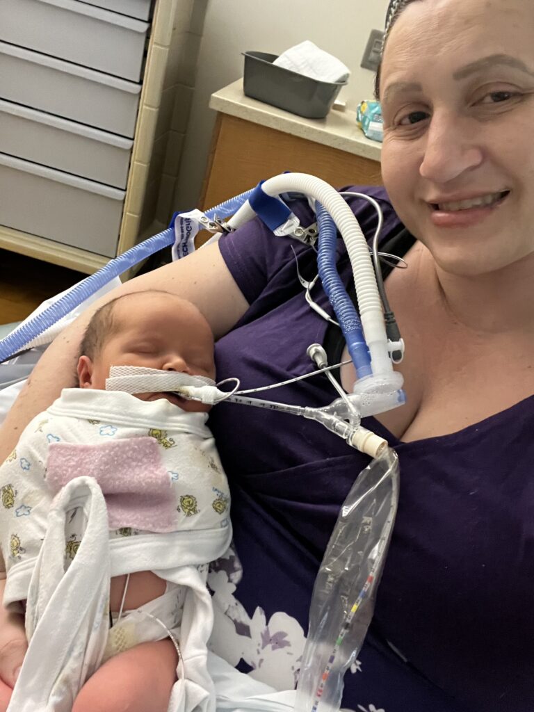 Jamie McMillan holds Joslyn during her NICU stay