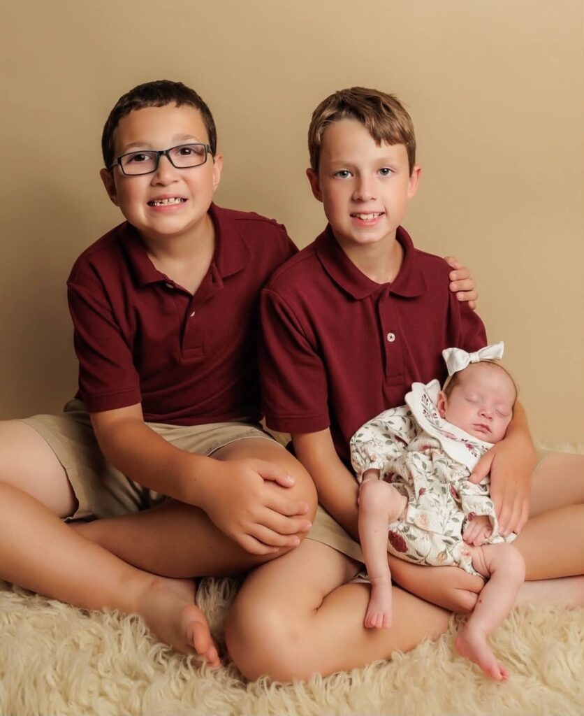 Carter and Colton Stephens with their baby sister Sophie