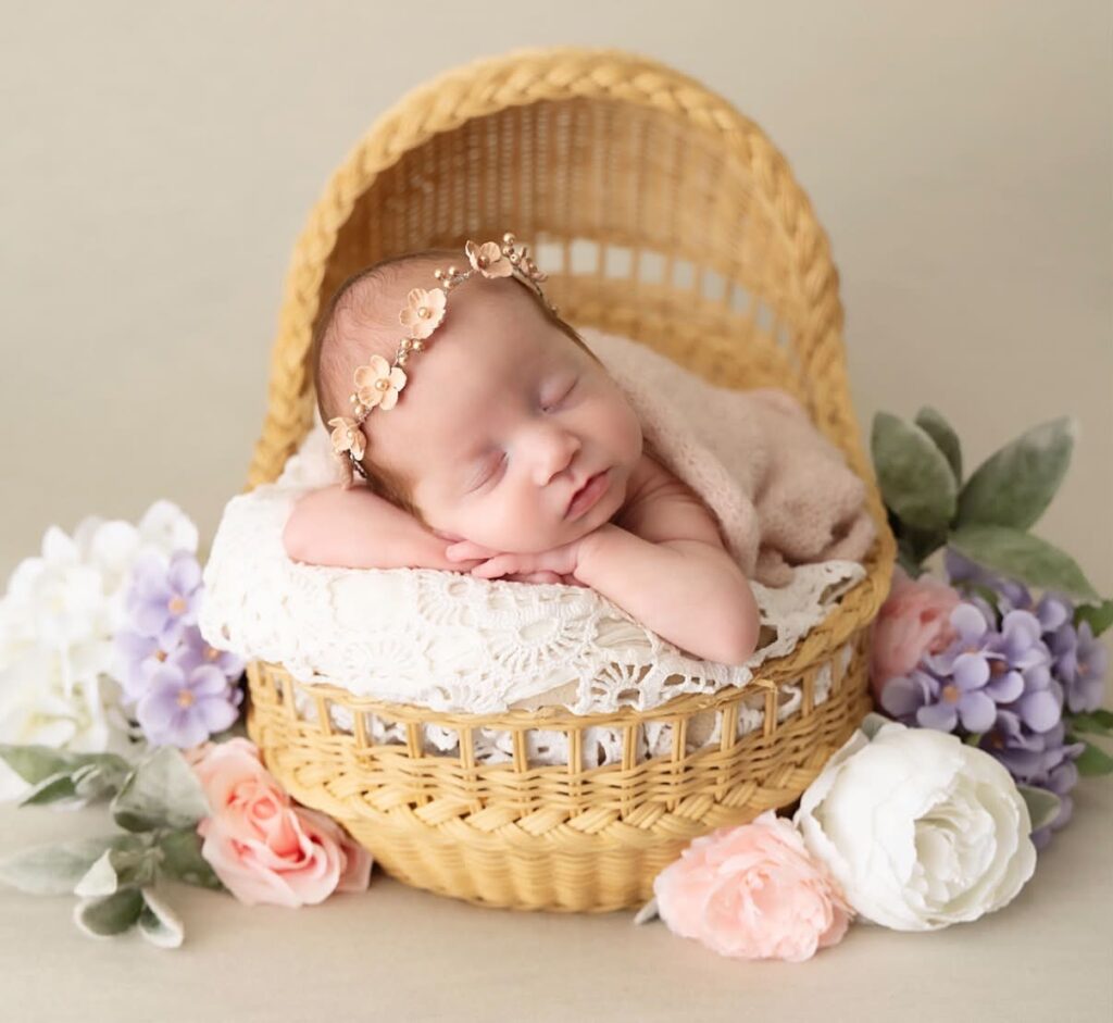 Sophie Stephens sleeping during a newborn portrait after leaving the NICU